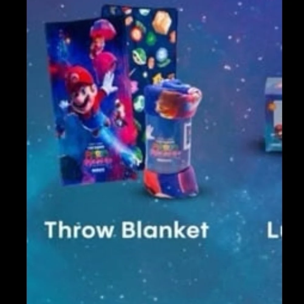 Super Mario Galaxy Movie Yoshi Popcorn Bucket & Mario Galaxy Throw Blanket
